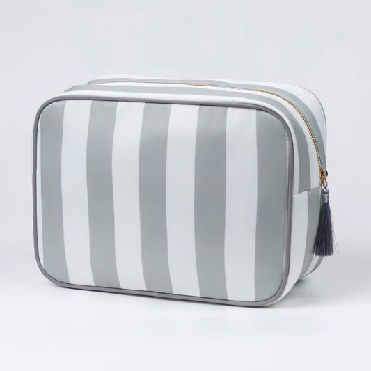 grey and white striped mahjong tile bag on white background
