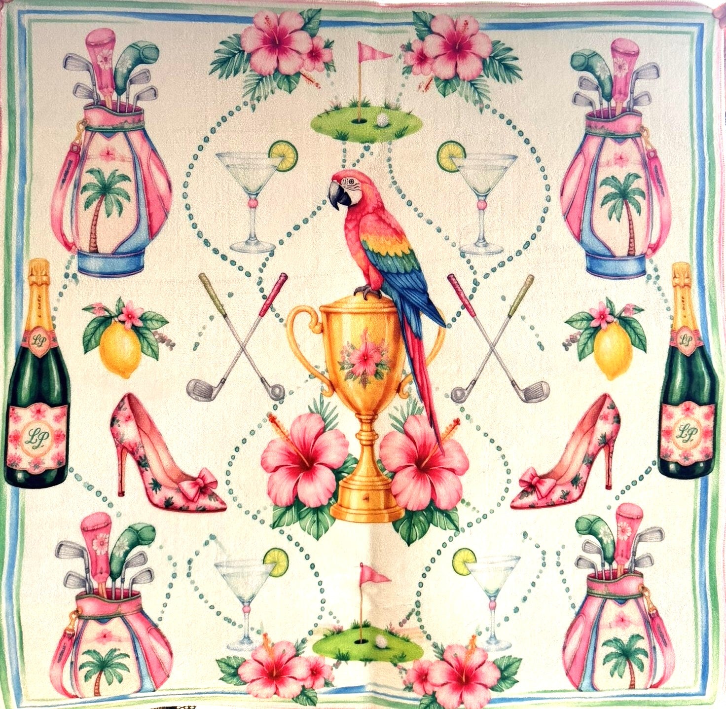 Mahjong Mat with Patterned fabric with golf clubs, parrot, high heels, and flowers on an off white background