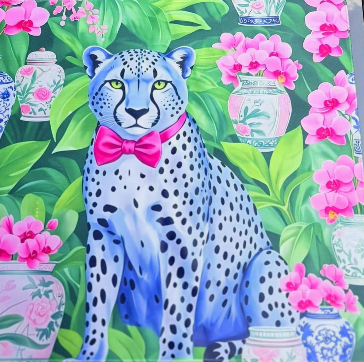Colorful mahjong  mat with a cheetah design on a floral and vase patterned background
