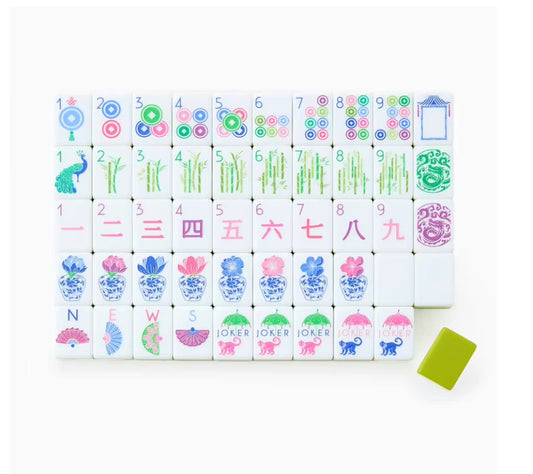 set of lime green and white acrylic mahjong tile set with white background.