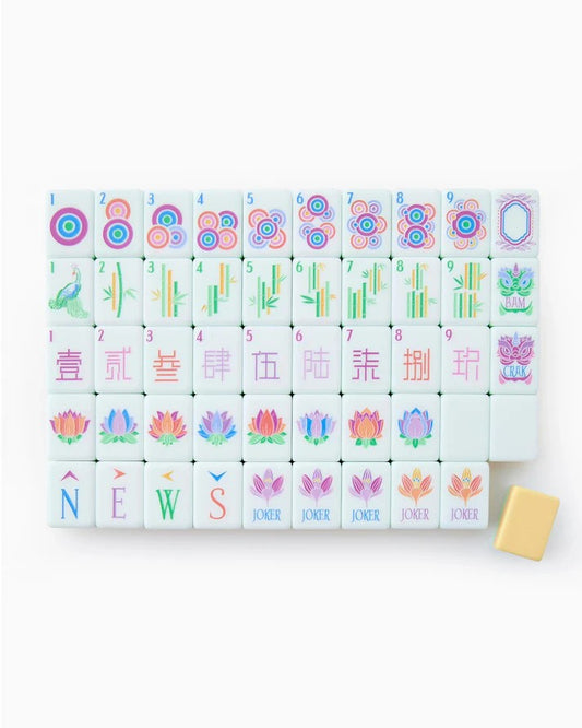 set of yellow and white acrylic mahjong tiles with white background